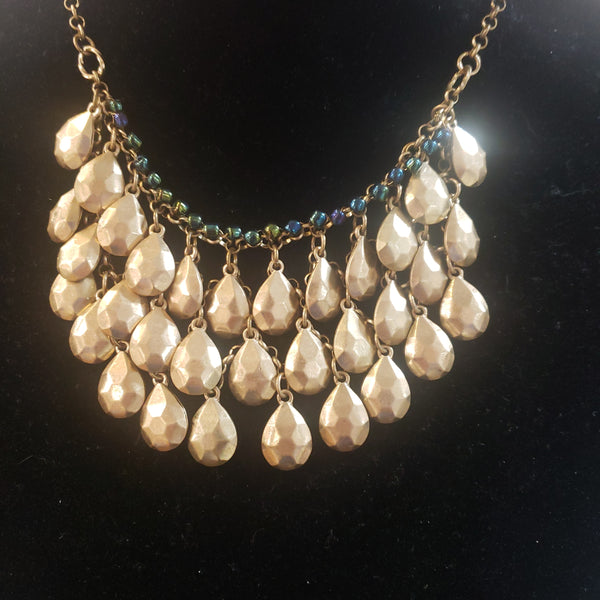 Matted gold ornate bib necklace set