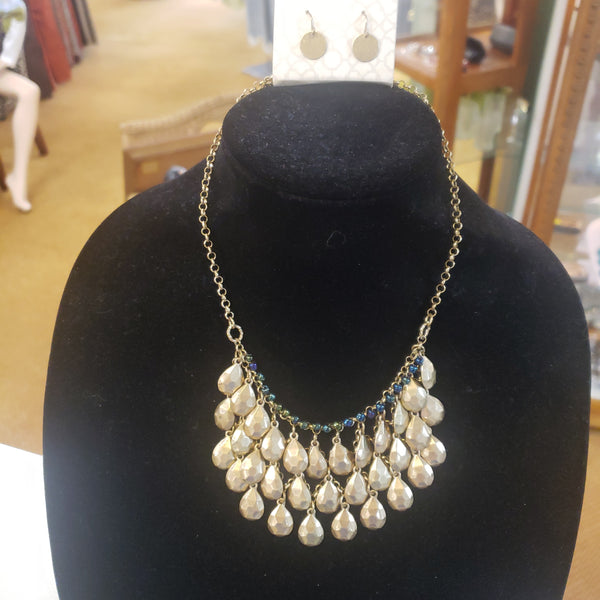 Matted gold ornate bib necklace set