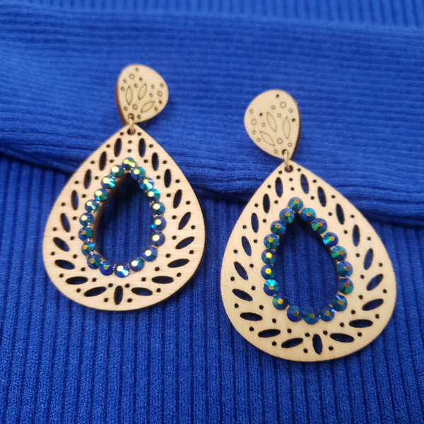 Ivory wood teardrop with blue stone earring