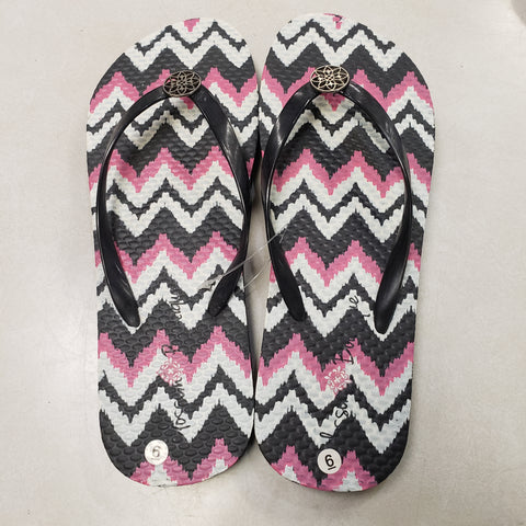 Black chevron flip flops