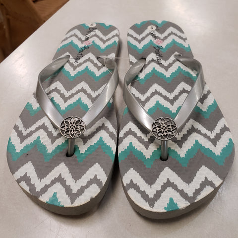 Gray chevron flip flops