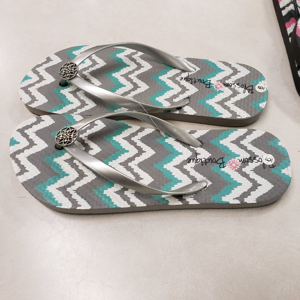 Gray chevron flip flops