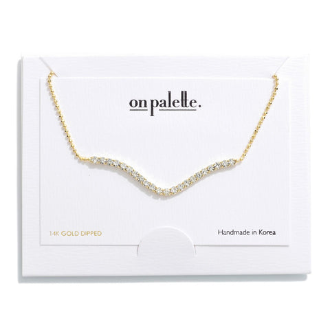 Gold beaded rhinestone necklace