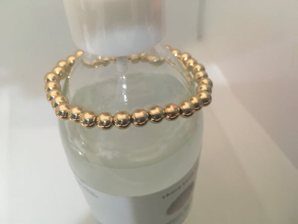 Gold beaded stretch bracelet