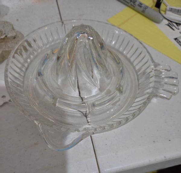 Vintage clear glass orange juicer with handle and spout
