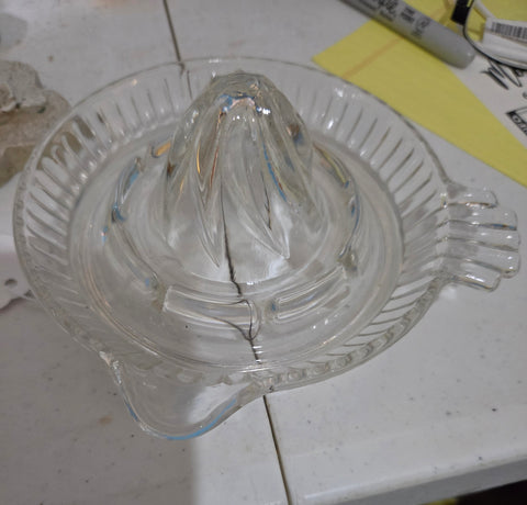 Vintage clear glass orange juicer with handle and spout