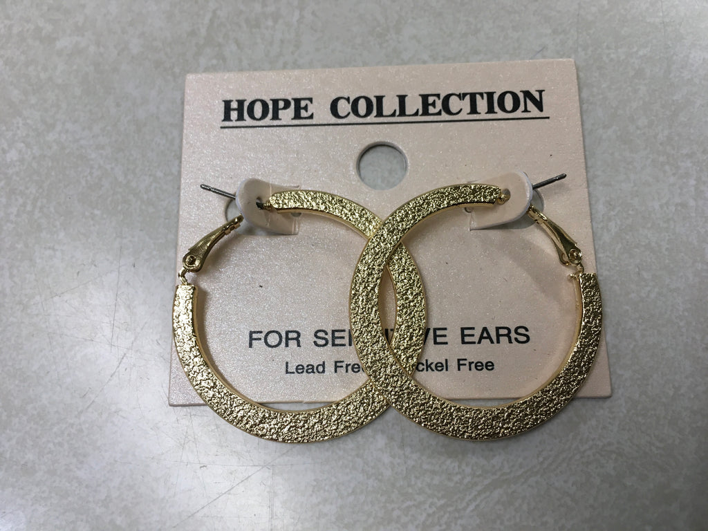 Gold hammered thick hoop earring