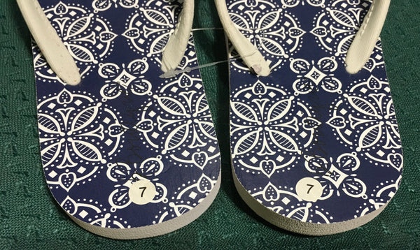 Geometric blue flip flops