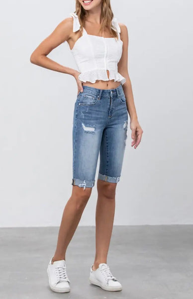 Mid rise distressed Bermuda denim short