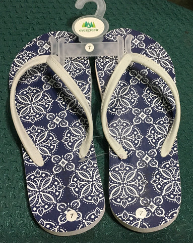 Geometric blue flip flops