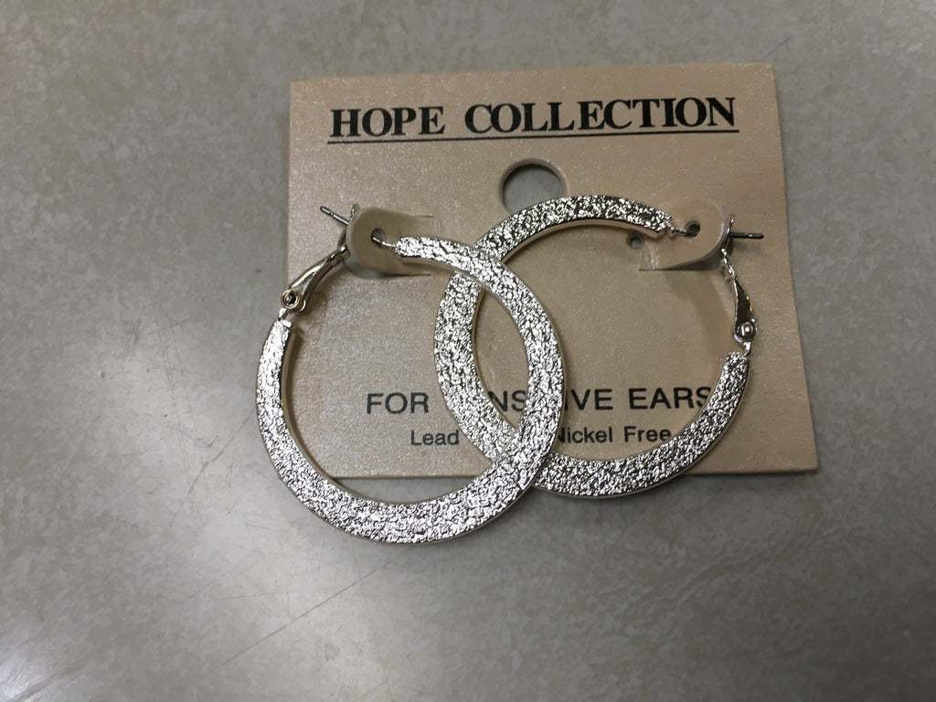 Silver hammered hoop earring