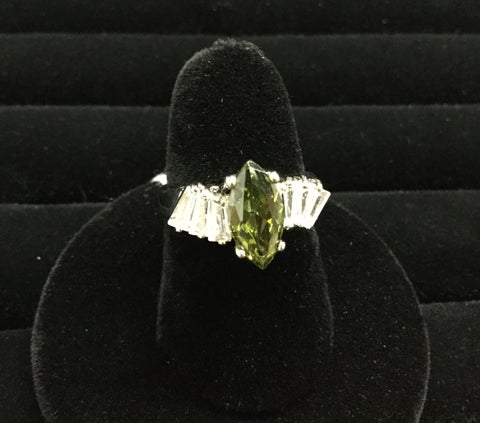 Green center stone and baguettes ring size 6