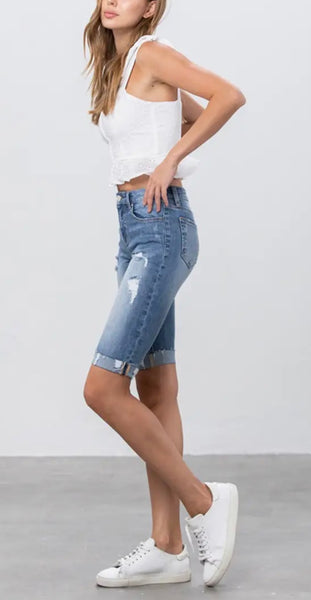 Mid rise distressed Bermuda denim short
