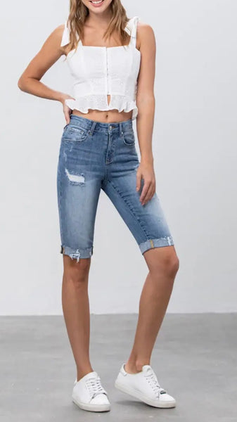 Mid rise distressed Bermuda denim short