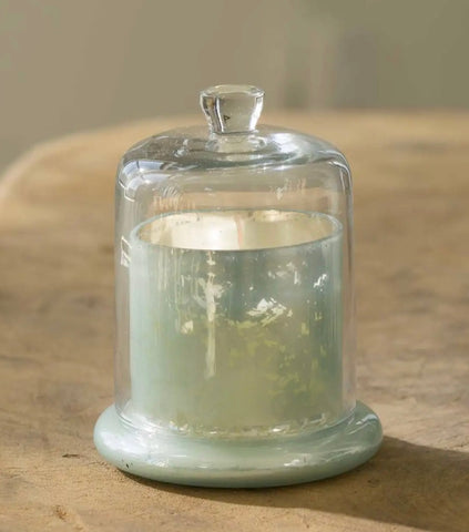 White suede silver glass covered candle